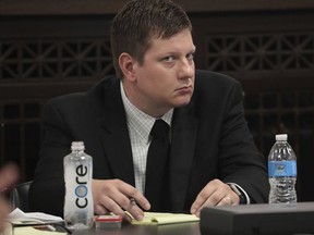Chicago Police Officer Jason Van Dyke listens during his trial for the shooting death of Laquan McDonald at the Leighton Criminal Court Building, Monday, Sept. 17, 2018 in Chicago. McDonald died during a confrontation with Van Dyke on Oct. 20, 2014, in Chicago.