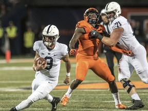 Penn State quarterback Trace McSorley (9) runs the ball against Illinois during the first half of an NCAA college football game Friday, Sept. 21, 2018, in Champaign, Ill.