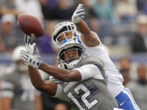 Duke's Michael Carter II, top, breaks up a pass intended for Northwestern's JJ Jefferson during the first half of an NCAA college football game Saturday, Sept. 8, 2018, in Evanston, Ill.