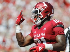 Indiana's Stevie Scott (21) celebrates scoring a touchdown against Ball State during an NCAA college football game, Saturday, Sept. 15, 2018 in Bloomington, Ind.