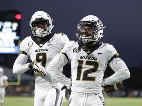 Missouri wide receiver Johnathon Johnson (12) celebrates a touchdown with Jalen Knox (9) during the first half of an NCAA college football game against Purdue in West Lafayette, Ind., Saturday, Sept. 15, 2018.