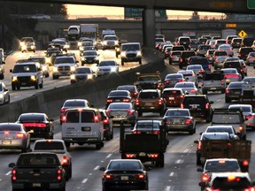 FILE - In this Nov. 15, 2016 file photo morning rush hour traffic makes it's way along US 101 near downtown Los Angeles. Activists seeking to repeal California's gas tax increase are proposing another ballot measure aimed at providing replacement transportation funding and nixing the state's high-speed rail project. Supporters of Proposition 6 said Tuesday, Sept. 25, 2018, they will file a proposed initiative for the 2020 ballot that would designate existing tax revenues for transportation projects and end the state's plan to build a high-speed train. The proposal is seen as a counterpart to this year's ballot initiative to repeal a fuel tax increase that is funding transportation projects in the state.