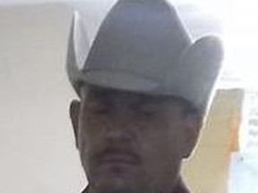 This undated photo released by the Phoenix Police Department on Saturday, Sept. 1, 2018 shows Dimas Coronado, 46, 5'06" tall, 190 pounds, with gray hair and brown eyes. An Amber Alert has been issued for two young brothers and their father, Coronado, missing since the boys' mother and a male housemate were found fatally shot in the Phoenix home where police said the victims and boys lived. (Phoenix Police Department via AP)