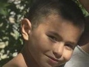 This undated photo released by the Phoenix Police Department on Saturday, Sept. 1, 2018 shows missing child Victor Nunez-Coronado, 8 years old, 4' tall, 60 pounds, with black hair and brown eyes. An Amber Alert has been issued for Victor and his brother, Jonathan, and their father, Dimas Coronado, missing since the boys' mother and a male housemate were found fatally shot in the Phoenix home where police said the victims and boys lived. (Phoenix Police Department via AP)