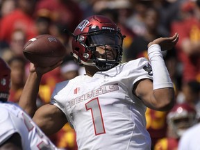 UNLV quarterback Armani Rogers passes during the first half of an NCAA college football game against the Southern California, Saturday, Sept. 1, 2018, in Los Angeles.