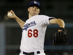 Los Angeles Dodgers starting pitcher Ross Stripling delivers to a San Diego Padres batter during the first inning of a baseball game in Los Angeles, Friday, Sept. 21, 2018.