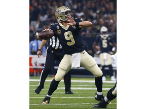 New Orleans Saints quarterback Drew Brees (9) passes in the first half of an NFL football game against the Tampa Bay Buccaneers in New Orleans, Sunday, Sept. 9, 2018.