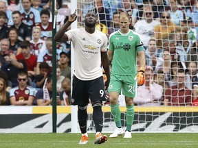 Manchester United's Romelu Lukaku celebrates after scoring his side's first goal during the Premier League match against Burnley, at Turf Moor, Burnley, England, Sunday, Sept. 2, 2018.