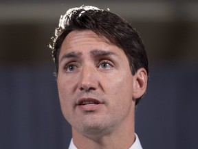 Prime Minister Justin Trudeau is seen during a media availability following the Liberal caucus in Saskatoon, Sask. Thursday, Sept. 13, 2018.