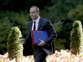 Britain's Secretary of State for Exiting the European Union Dominic Raab arrives for a cabinet meeting on Brexit at 10 Downing Street in London, Thursday, Sept. 13, 2018.