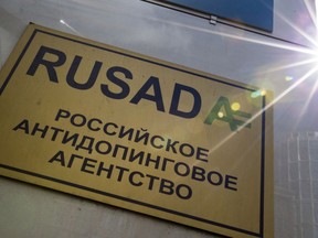 FILE -The May 24, 2016 file photo shows a RUSADA sign reading "Russian National Anti-doping Agency" on a building in Moscow, Russia.  The World Anti-Doping Agency is due to vote Thursday Sept. 20, 2018, on possible reinstatement of Russia's anti-doping agency, RUSADA, but opponents feel Russia can't be trusted to reform without first accepting more of the blame.