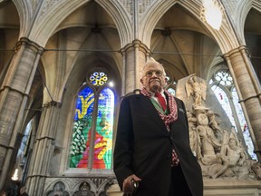 British artist David Hockney stands in front of The Queen's Window, a new stained glass window at Westminster Abbey, London, designed by David Hockney and revealed for the first time on Wednesday Sept. 26, 2018.