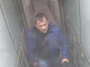 This still taken from CCTV and issued by the Metropolitan Police in London on Wednesday Sept. 5, 2018, shows Alexander Petrov at Gatwick airport, England on March 2, 2018. British prosecutors have charged two Russian men, Alexander Petrov and Ruslan Boshirov, with the nerve agent poisoning of ex-spy Sergei Skripal and his daughter Yulia in the English city of Salisbury. They are charged in absentia with conspiracy to murder, attempted murder and use of the nerve agent Novichok.