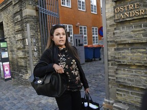 Betina Hald Engmark, defense attorney of Peter Madsen, arrives for the verdict of the appeal in the case of Peter Madsen, at the Eastern High Court in Copenhagen, Denmark, Wednesday Sep. 14, 2018. Danish submarine inventor Peter Madsen, who was found guilty of the torture, sexual assault, murder and dismemberment of a Swedish reporter, challenged his life sentence.