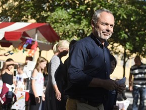 Jan Bjorklund, leader of the Liberal Party, arrives at a polling station in Stockholm, Sweden, Sunday Sept. 9, 2018. Polls have opened in Sweden's general election in what is expected to be one of the most unpredictable and thrilling political races in Scandinavian country for decades amid heated discussion around top issue immigration.