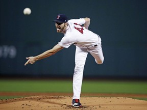 Boston Red Sox starting pitcher Chris Sale delivers during the first inning of a baseball game against the Toronto Blue Jays at Fenway Park in Boston, Tuesday, Sept. 11, 2018.