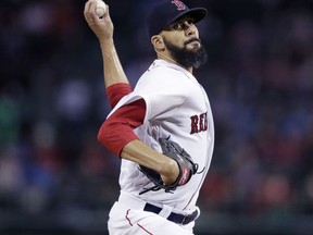 Boston Red Sox starting pitcher David Price delivers during the first inning of a baseball game against the Toronto Blue Jays at Fenway Park in Boston, Wednesday, Sept. 12, 2018.