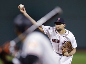 Boston Red Sox starting pitcher Nathan Eovaldi delivers during the first inning of a baseball game against the Baltimore Orioles at Fenway Park in Boston, Monday, Sept. 24, 2018.