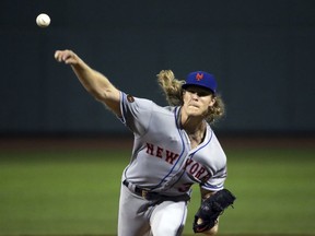 New York Mets starting pitcher Noah Syndergaard delivers to the Boston Red Sox in the first inning of a baseball game at Fenway Park, Friday, Sept. 14, 2018, in Boston.