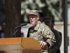 U.S. Army Gen. Austin Miller speaks during the change of command ceremony at Resolute Support headquarters in Kabul, Afghanistan, Sunday, Sept. 2, 2018. Miller assumed command of the 41-nation NATO mission in Afghanistan following a handover ceremony.