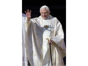 FILE - This Oct. 19, 2014 file photo shows Pope Emeritus Benedict XVI arrives in St. Peter's Square at the Vatican to attend the beatification ceremony of Pope Paul VI, and a mass for the closing of of a two-week synod on family issues, celebrated by Pope Francis. A German newspaper that quoted letters by Benedict XVI hitting back at criticism of his 2013 resignation says he was responding to a conservative German cardinal who took issue with his decision to take the title "emeritus pope."