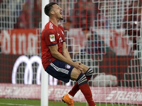 Bayern's Sandro Wagner reacts after missing to score during the German Bundesliga soccer match between FC Bayern Munich and FC Augsburg in Munich, Germany, Tuesday, Sept. 25, 2018.