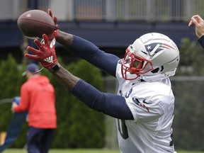 New England Patriots wide receiver Josh Gordon catches the ball during an NFL football practice, Wednesday, Sept. 19, 2018, in Foxborough, Mass.