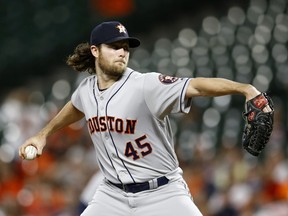 Houston Astros starting pitcher Gerrit Cole throws to the Baltimore Orioles in the first inning of a baseball game, Friday, Sept. 28, 2018, in Baltimore.