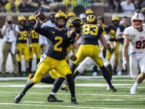 Michigan quarterback Shea Patterson (2) throws a pass in the second quarter of an NCAA college football game against SMU in Ann Arbor, Mich., Saturday, Sept. 15, 2018.