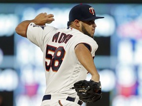 Minnesota Twins pitcher Gabriel Moya throws to a Detroit Tigers batter during the first inning of a baseball game Tuesday, Sept. 25, 2018, in Minneapolis.