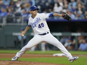 Kansas City Royals pitcher Heath Fillmyer throws to a Minnesota Twins batter in the first inning of a baseball game at Kauffman Stadium in Kansas City, Mo., Thursday, Sept. 13, 2018.