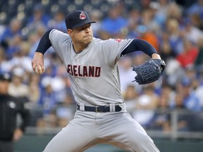 Cleveland Indians starting pitcher Corey Kluber throws during the first inning of a baseball game against the Kansas City Royals on Saturday, Sept. 29, 2018, in Kansas City, Mo.