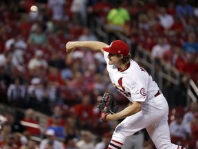 St. Louis Cardinals starting pitcher Miles Mikolas throws during the first inning of a baseball game against the Pittsburgh Pirates Tuesday, Sept. 11, 2018, in St. Louis.