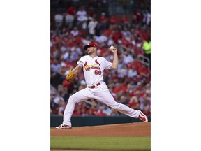 St. Louis Cardinals starting pitcher Austin Gomber (68) delivers during the first inning of a baseball game against the Cincinnati Reds, Friday, Aug. 31, 2018, in St. Louis.