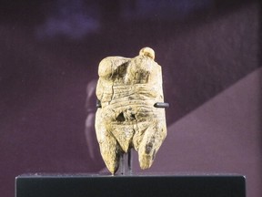 Venus von Hohle Fels, an ivory figurine dating back to between 40,000 and 35,000 BC, displayed at the Martin-Gropius-Bau museum in Berlin, Thursday, Sept. 20, 2018. The new exhibition showcasing more than 1,000 major archaeological finds from the past 20 years shows reveals how Germany has been at the heart of European trade, migration, conflict and innovation since the Stone Age. The exhibition runs from Sept. 21, 2018 until Jan. 6, 2019.