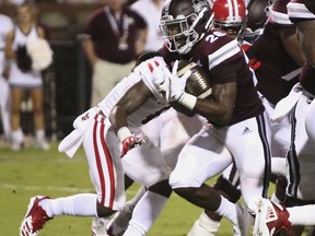 Mississippi State running back Aeris Williams (26) sprints into the end zone for a touchdown past Louisiana-Lafayette defensive back Corey Turner (6) during the first half of their NCAA college football game on Saturday, Sept. 15, 2018, in Starkville, Miss.