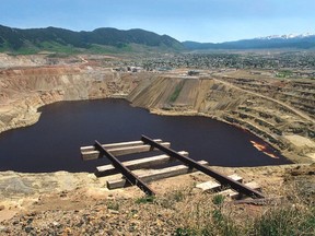 FILE - This undated photo shows the Berkeley Pit in Butte, Mont. U.S. Environmental Protection Agency Acting Administrator David Wheeler planned to visit Butte, Friday, Sept. 7, 2018, after an estimated 3,000 snow geese died when they landed in the pit in 2016.