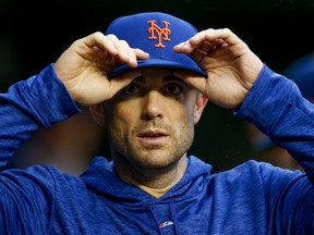 New York Mets' David Wright walks through the dugout during a baseball game against the Washington Nationals at Nationals Park, Sunday, Sept. 23, 2018, in Washington. Wright has not played for the Mets since May 2016 because of neck, back and shoulder injuries.