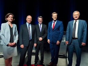 NDP Jennifer McKenzie, left to right, Green Party David Coon, People's Alliance Kris Austin, Liberal Brian Gallant, PC Blain Higgs pose for photos before the start of the New Brunswick leaders debate in Riverview, New Brunswick on Wednesday September 12, 2018.