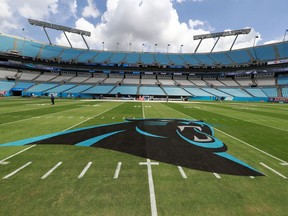 The Carolina Panthers logo is shown at mid-field before an NFL football game between the Carolina Panthers and the Dallas Cowboys in Charlotte, N.C., Sunday, Sept. 9, 2018.