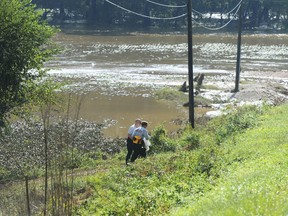 Rescue workers recover the body of a 1-year-old in Union County on Monday, Sept. 17, 2018 after the child was swept away in floodwaters resulting from the remnants of Hurricane Florence on Sunday.