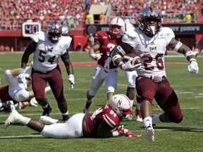 Troy running back B.J. Smith (26) runs into the end zone past Nebraska defensive lineman Khalil Davis (94) during the first half of an NCAA college football game in Lincoln, Neb., Saturday, Sept. 15, 2018.