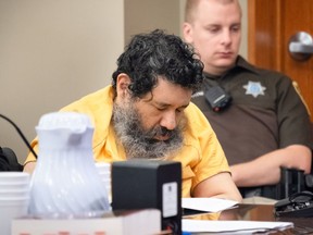 FILE- In this June 13, 2018, file photo convicted killer Anthony Garcia attends a hearing at the Douglas County District Court in Omaha, Neb. The former doctor found guilty of what prosecutors described as the revenge killing of four people connected to a Nebraska medical school where he once worked is facing life in prison or the death penalty. A three-judge panel is expected to sentence Garcia on Friday, Sept. 14.