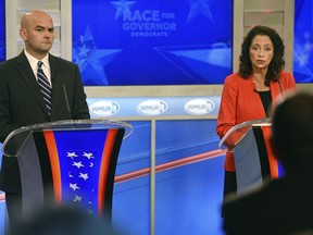 FILE - In this Sept. 4, 2018, file photo, former Portsmouth Mayor Steve Marchand, left, and former state Sen. Molly Kelly participate in a Democratic gubernatorial debate at Saint Anselm College in Goffstown, N.H. The two Democrats face off the in Tuesday, Sept. 11 primary for the chance to take on Republican Gov. Chris Sununu in the November general election.
