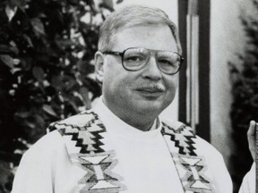 FILE - This 1989 file photo shows Father Arthur Perrault in Albuquerque, N.M. Perrault, who fled the U.S. decades ago amid allegations of child sex abuse and once blamed his behavior on a cancer diagnosis which prosecutors say he didn't have, is scheduled to appear in court Tuesday, Sept. 25, 2018. (The Albuquerque Journal via AP, File)