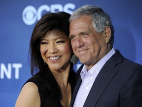 FILE - In this June 16, 2014 file photo, Les Moonves, right, president and CEO of CBS Corporation, and his wife Julie Chen pose together at the premiere of the CBS science fiction television series "Extant" in Los Angeles. Chen returned to television with an unusual sign-off days after her husband, Les Moonves, resigned as CBS CEO following sexual misconduct allegations.  The 48-year-old ended Thursday, Sept. 13, 2018  "Big Brother" broadcast by saying, "From outside the 'Big Brother' house, I'm Julie Chen Moonves. Good night." Usually, she just says "Julie Chen."