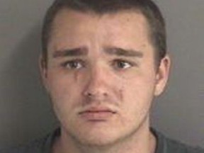 This booking photo provided by the Story County (Iowa) Jail shows Collin Daniel Richards.  Richards has been charged in the killing of Celia Barquin Arozamena, a former champion golfer from Spain, after her body was found Monday, Sept. 17, 2018 at a golf course in Ames, Iowa.  (Story County (Iowa) Jail via AP)