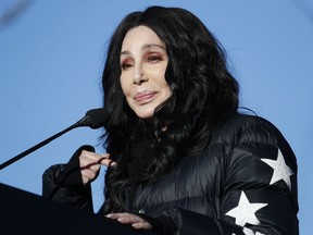 FILE - In this Jan. 21, 2018 file photo, Cher speaks during a women's march rally in Las Vegas. Authorities say a man living at Cher's home in Malibu, Calif., has been arrested on suspicion of providing fentanyl to someone who died of an overdose. NBC Los Angeles reports that 23-year-old Donovan Ruiz was arrested by Ventura County sheriff's investigators. Authorities say he is the child of someone who works at the home.