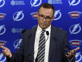 FILE - In this Feb. 26, 2018, file photo, Tampa Bay Lightning general manager Steve Yzerman gestures during a news conference before an NHL hockey game against the Toronto Maple Leafs, in Tampa, Fla. A person with knowledge of the move says Steve Yzerman is stepping down as general manager of the Tampa Bay Lightning and will be replaced immediately by assistant Julien BriseBois. The person spoke to The Associated Press on condition of anonymity Tuesday, Sept. 11, 2018, because the team had not announced Yzerman's decision.