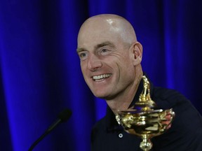 FILE - In this Sept. 4, 2018, file photo, Jim Furyk, U.S. Ryder Cup team captain, smiles during a news conference in West Conshohocken, Pa. The 42nd Ryder Cup Matches will be held in France from Sept. 28-30, 2018, at the Albatros Course of Le Golf National.